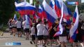 По главным улицам областного центра - с российскими триколорами в руках